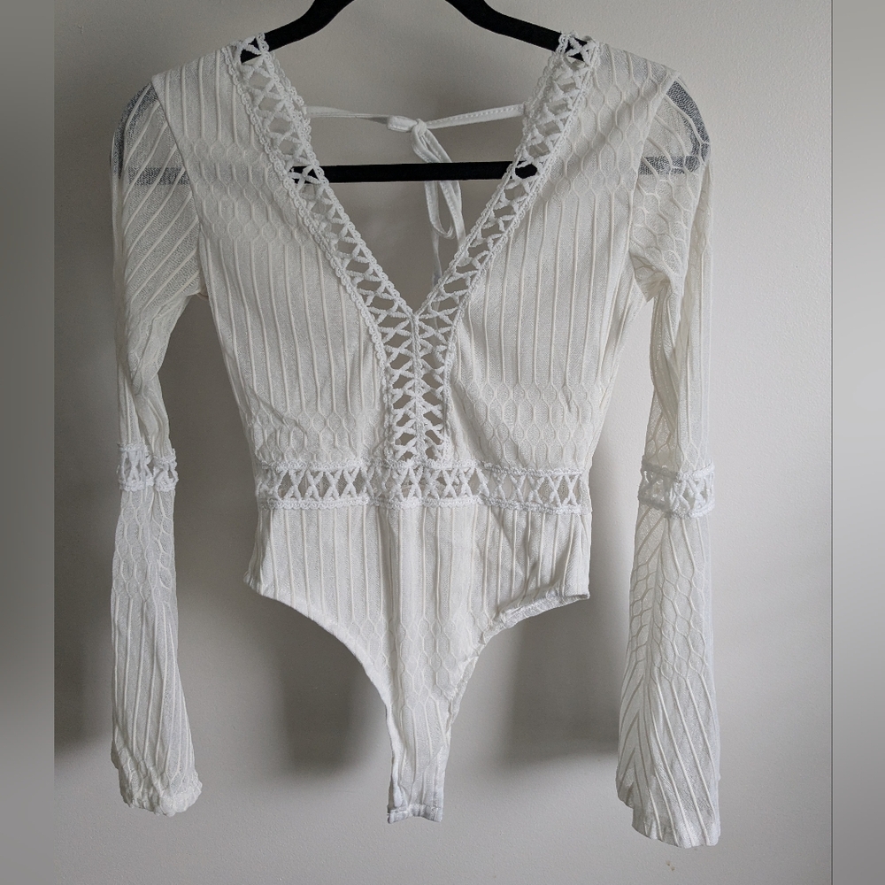 Elegant White Lace-Up Bodysuit